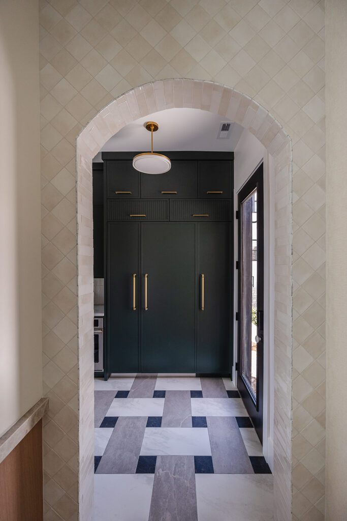 Custom butler’s pantry with built-in shelving and warm wood cabinetry in The Recipe Critic studio