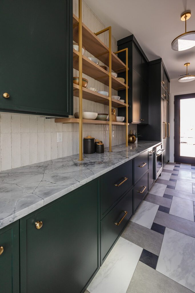 Pantry storage and prep area designed for efficient workflow in a blogger’s studio kitchen