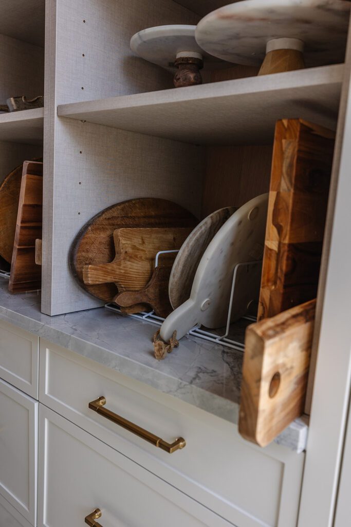Pantry storage and prep area designed for efficient workflow in a blogger’s studio kitchen