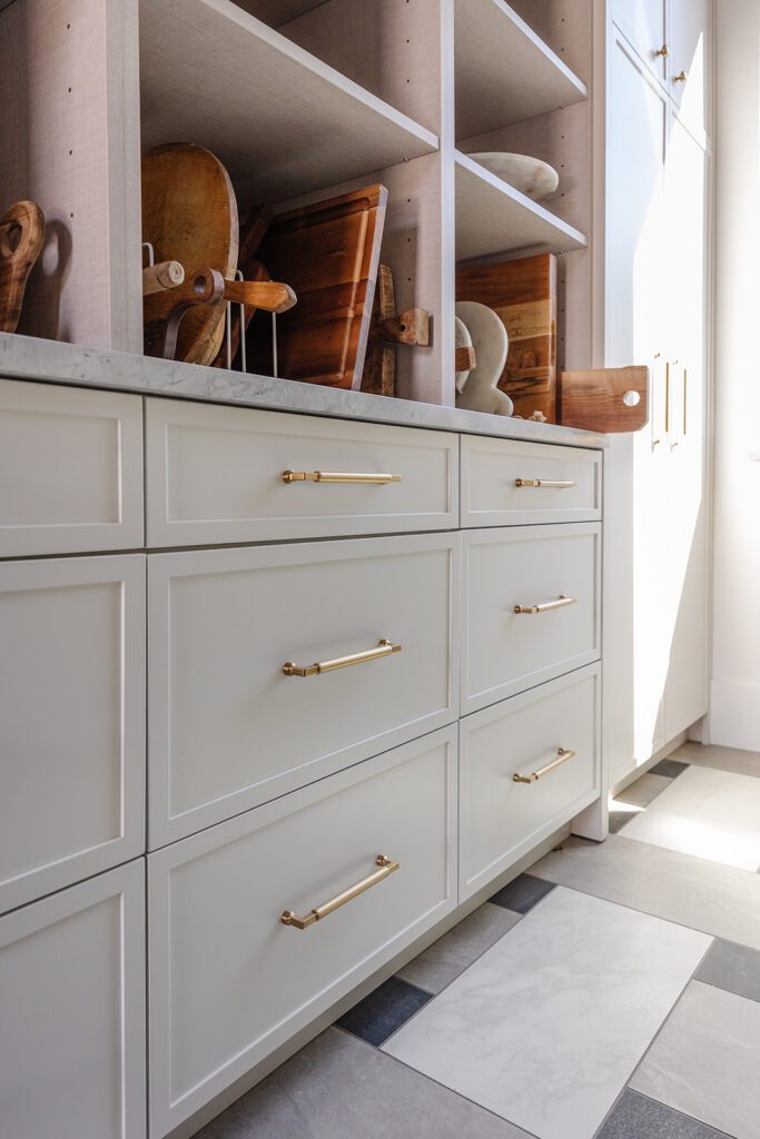 Pantry storage and prep area designed for efficient workflow in a blogger’s studio kitchen