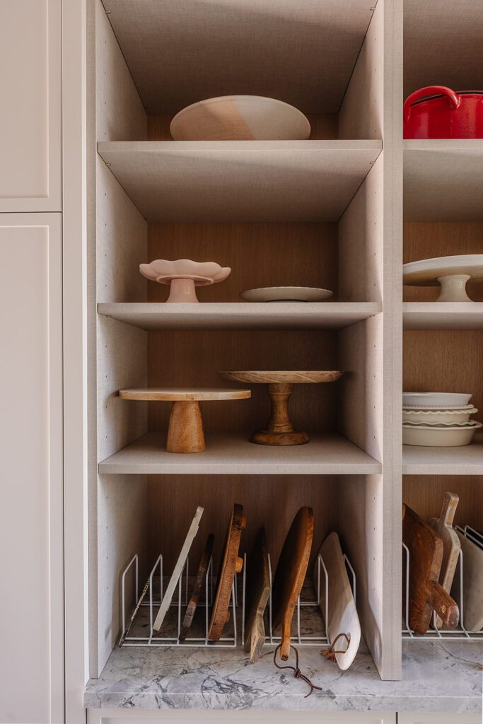 Pantry storage and prep area designed for efficient workflow in a blogger’s studio kitchen