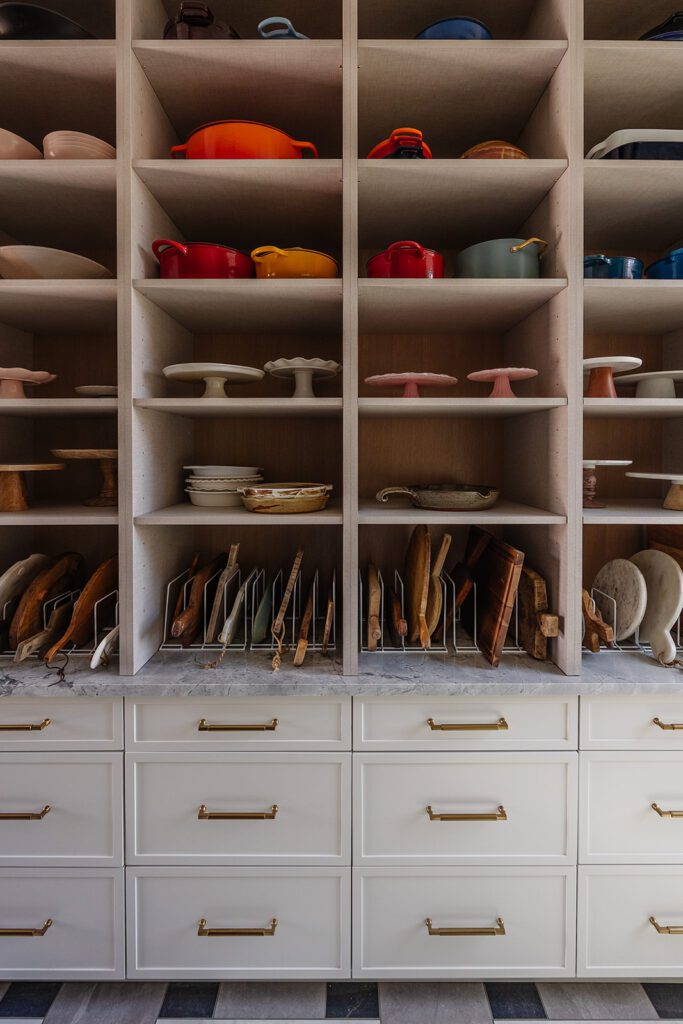 Pantry storage and prep area designed for efficient workflow in a blogger’s studio kitchen