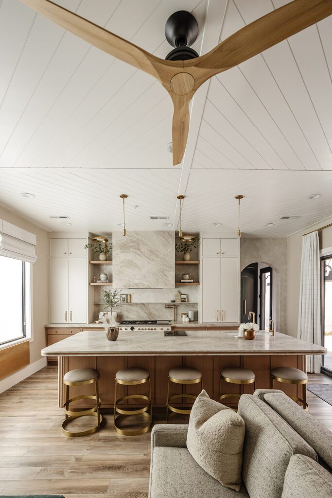 Luxury chef’s kitchen with large island and mixed textures in The Recipe Critic’s Alpine studio