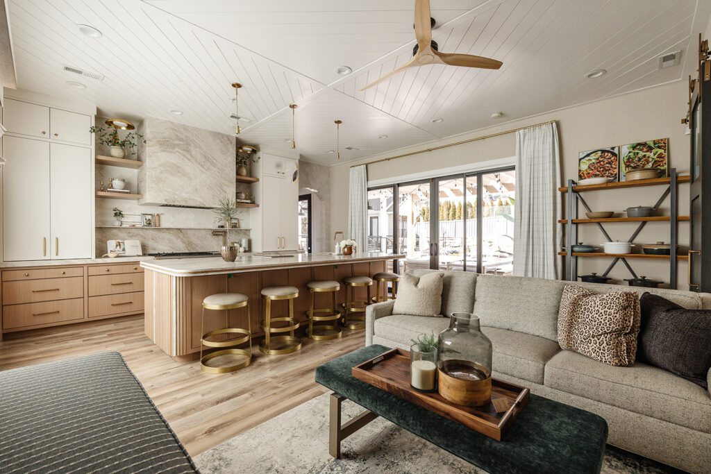 Luxury chef’s kitchen with large island and mixed textures in The Recipe Critic’s Alpine studio